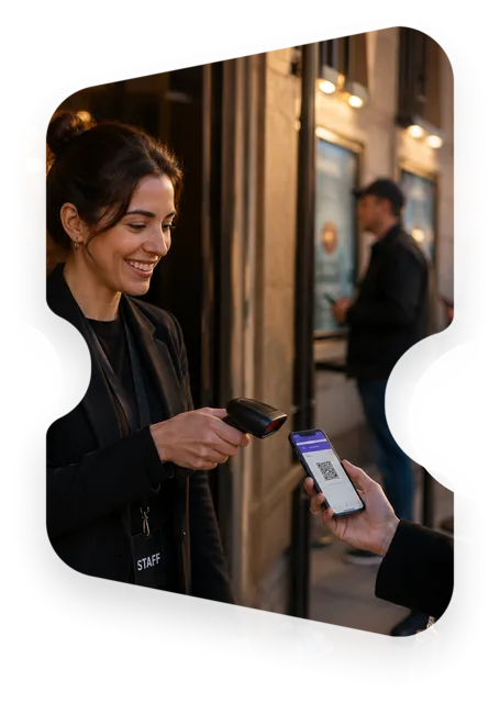 A steward scanning a guest phone at the door of a lit venue, masked into the Entrello ticket mark